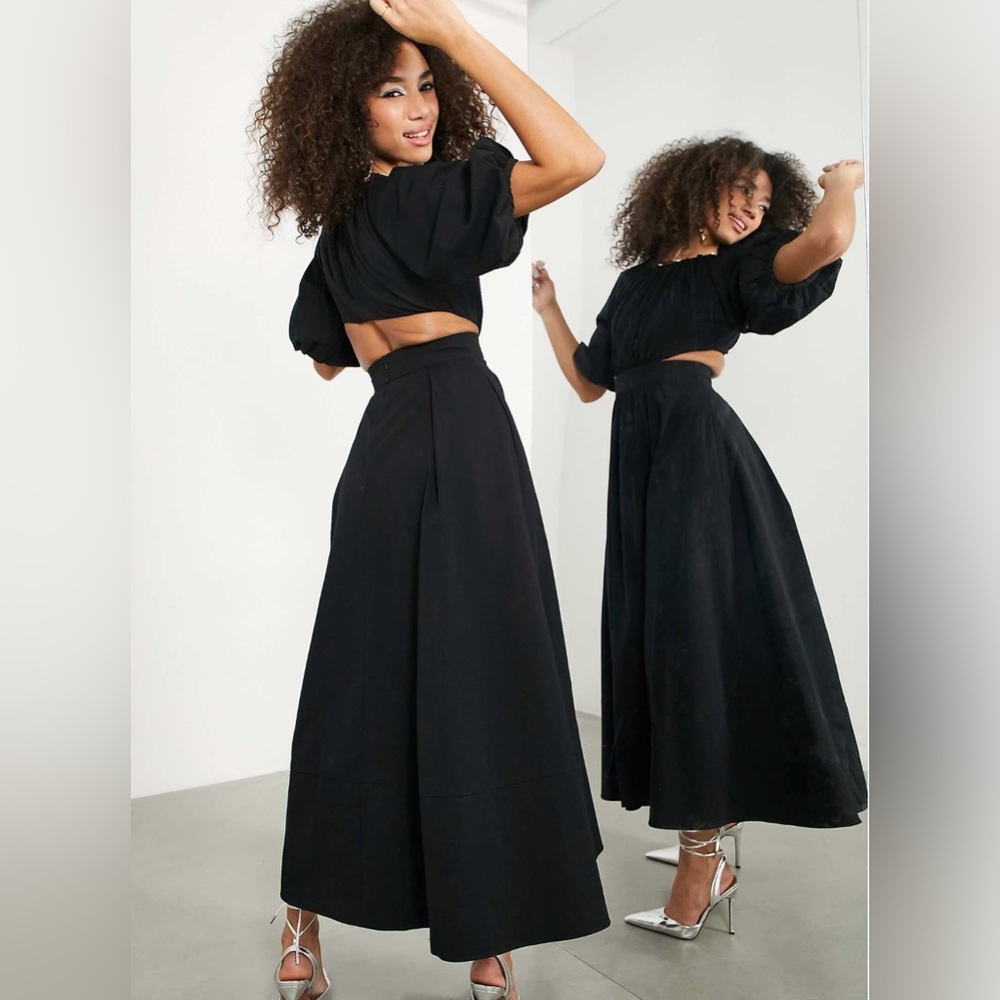 ASOS EDITION puff sleeve midi dress with cut out
back in black US 6